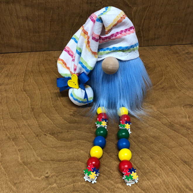 hand crafted gnome celebrating Autism with beaded legs and blue beaard.