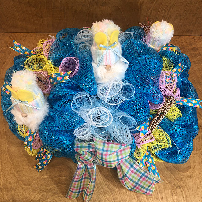 hand crafted Easter gnome centerpiece in blues, yellow, white and plaid