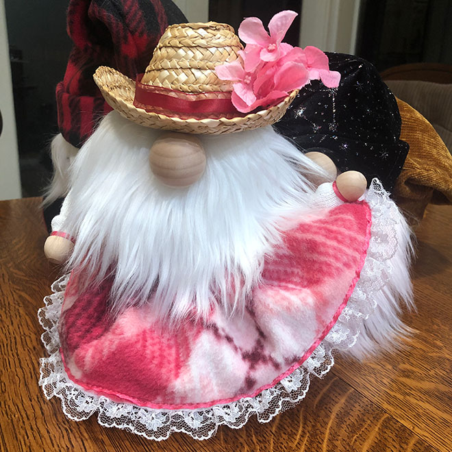 hand crafted square dance gnome in pink skirt and matching cowgirl hat. Cancer society donation.