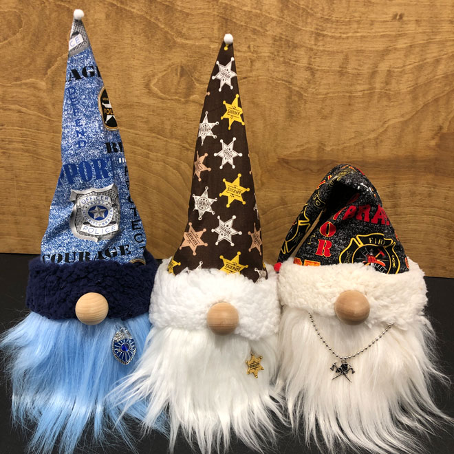 hand crafted gnomes, police, fire and sheriff.